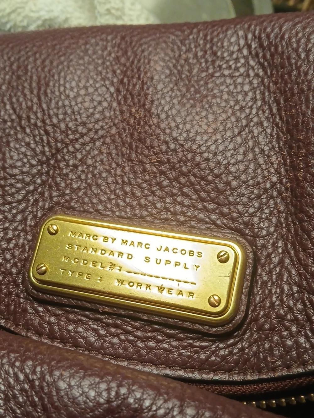 Marc Jacobswomens 's Wine Color  Pebbled Leather Messenger Bag with Gold Plate